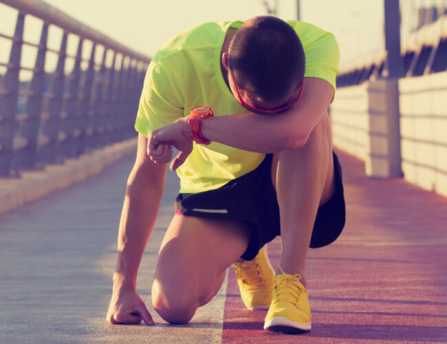 Tired/injured jogger on a big bridge.
